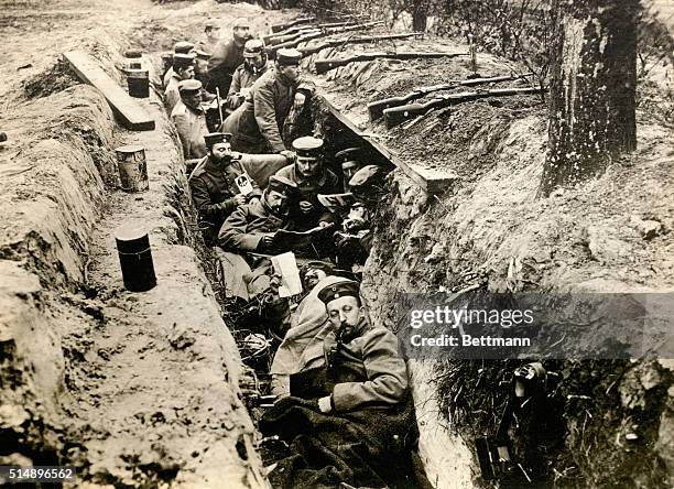 World War I trench Warfare. German Contingent relaxing in a trench during lull in battle.