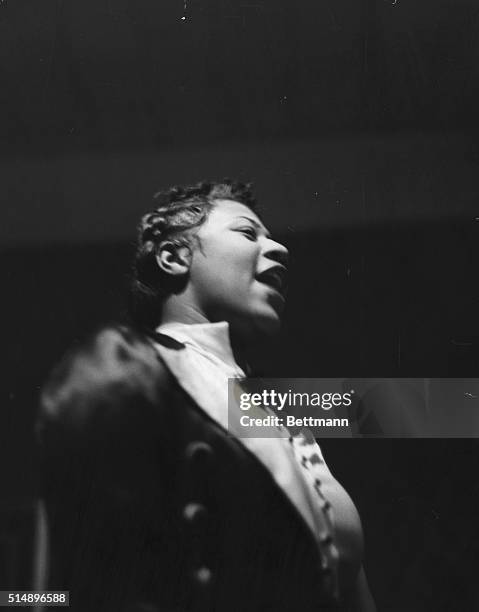 Harlem: Ella Fitzgerald in photo at Harlem night club.