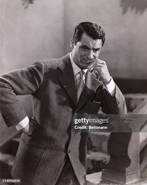 Cary Grant is captured here with a pensive look on his face.