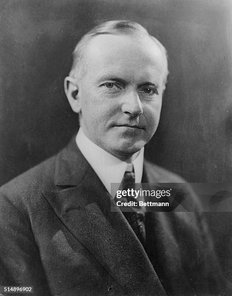 Calvin Coolidge is seen here, , the 30th President of the United States. This is a head and shoulders photograph.