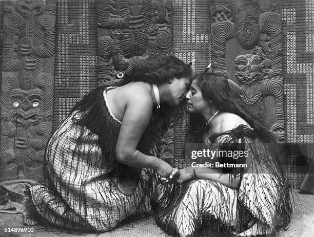 New Zealand-ORIGINAL CAPTION READS: "Hongi" Maori salutation in New Zealand. Photo shows two Maori women greeting each other. Undated photograph.