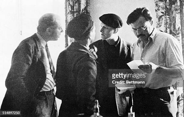 Ernest Hemingway, ,is shown here in the far right with John Dos Passos, , Joris Evans, and Sidney Franklin, in Madrid during the Spanish Civil War.