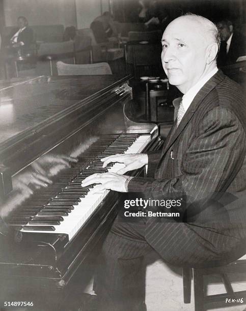 Dimitri Tiomkin, the Hollywood composer who won two Academy Awards for the film scores for High Noon and The High and the Mighty, playing the piano.