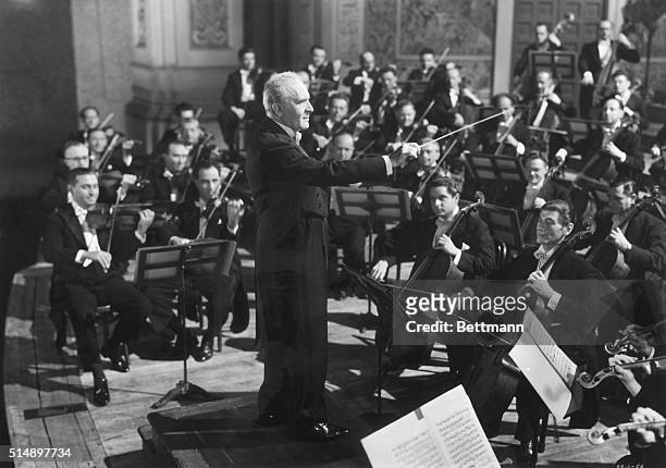 Dr. Bruno Walter leading the Philharmonic Orchestra.