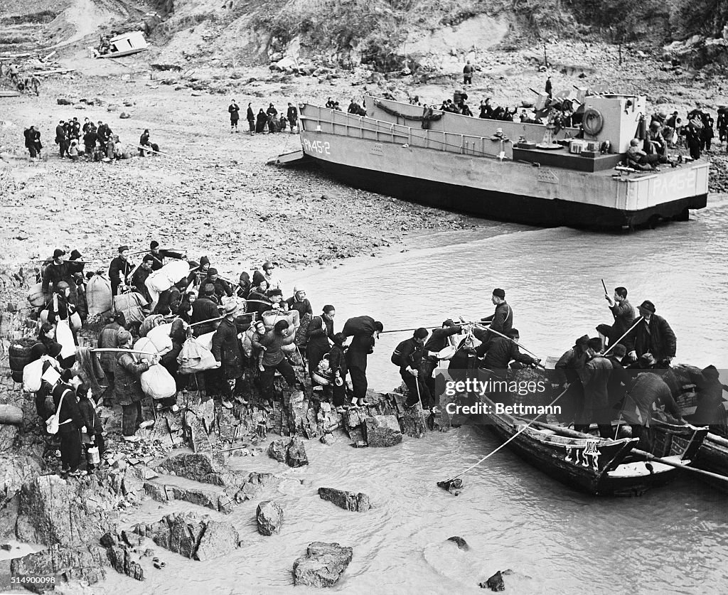 Chinese Nationalists Loading Belongings onto Sampans