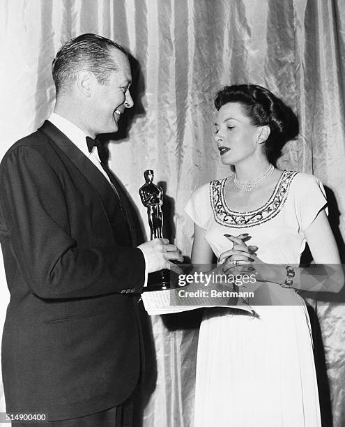 British actress Deborah Kerr, who is making her American debut opposite Clark Gable in Metro-Goldwyn-Mayer's "The Hucksters," receives from Robert...