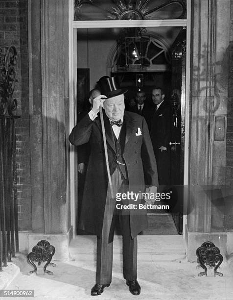Sir Winston Bows Out. London, England: Returning from Buckingham Palace after he handed over his seals of office as prime minister to Queen...