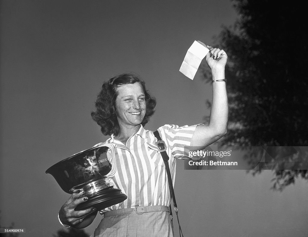 Babe Didrikson Waving Prize Check
