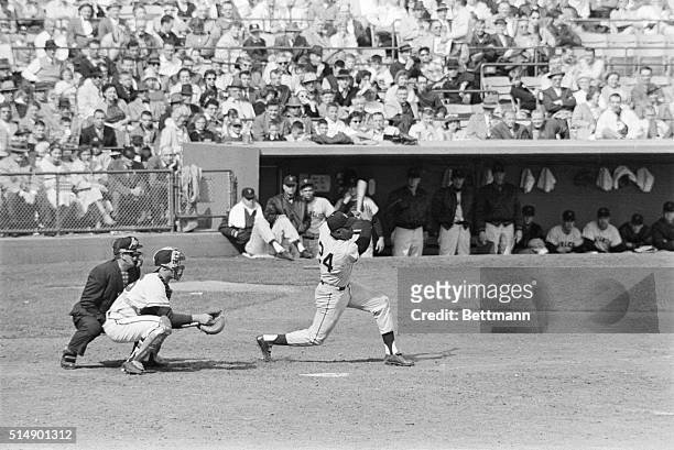 Willie Mays, San Francisco Giant centerfielder is shown as he hits his fourth home run in the eighth inning of the Giant-Milwaukee Braves game. Mays...