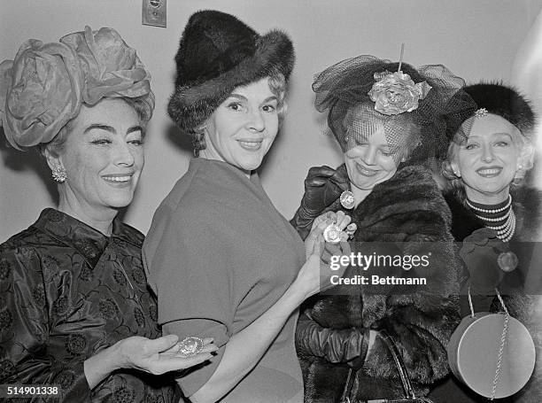 Notable Women Posing in Glamorous Hats, News Photo