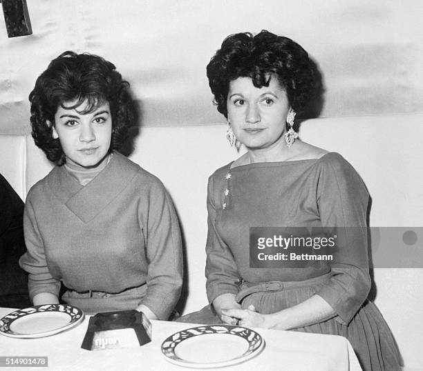 Teenage record star Annette Funicello shares a lunch table at the Harwyn Club with her ever present companion, her mother, Virginia Funicello, upon...