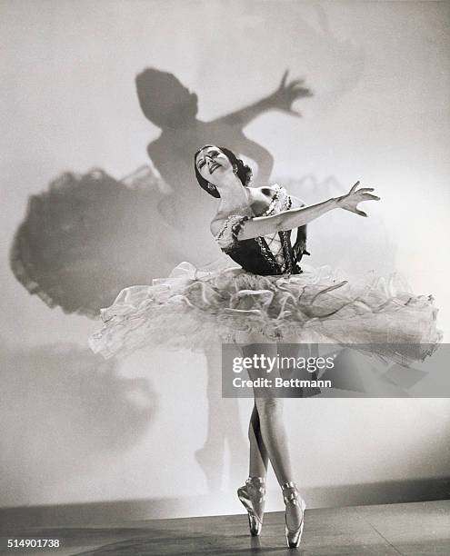 Madame Alicia Markova , famed English ballerina, tutu atwirl and en pointe, circa 1935.