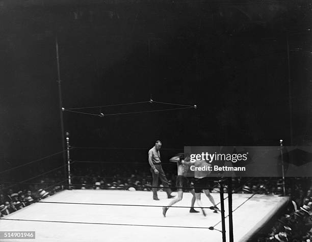 World light heavyweight champion Tommy Loughran boxing against James Braddock at Yankee Stadium.