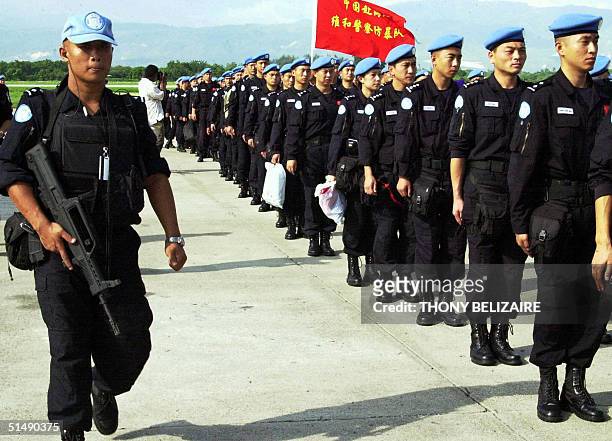 Ninety-five Chinese police arrive 17 October 2004 in Port-au-Prince from Beijing to reinforce the police component of the United Nations'...