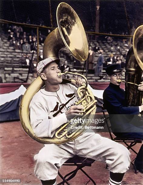 St. Louis, MO: Portrait of Dizzy Dean playing the tuba.