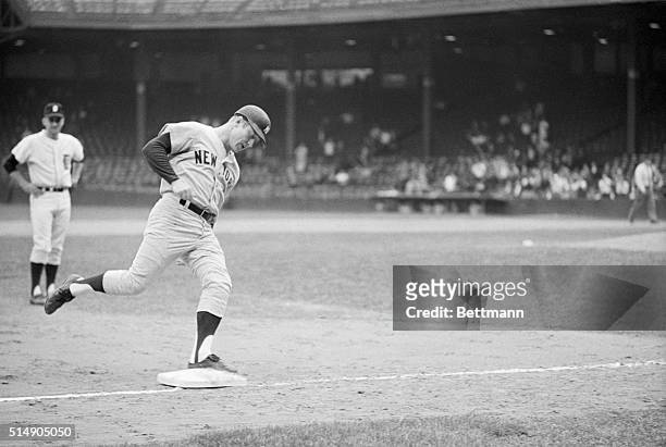 Detroit, MI: Tiger infielder Don Wert watches New York Yankees Mickey Mantle round third base after hitting his 535th lifetime homer during the...