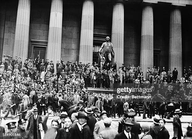 New York, NY: Photograph shows the street scene on Black Thursday, the day the New York stock market crashed, and the day that led to the Great...