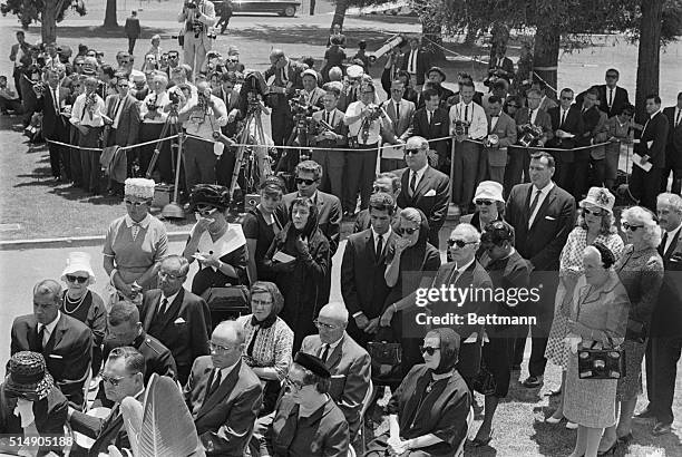 Westwood, CA: The invited mourners to the funeral services for actress Marilyn Monroe enter the Westwood Park Memorial Chapel August 8th, as...