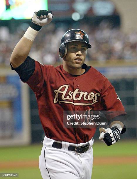 Carlos Beltran of the Houston Astros celebrates after hitting the game winning home run against the St. Louis Cardinals in game four of National...