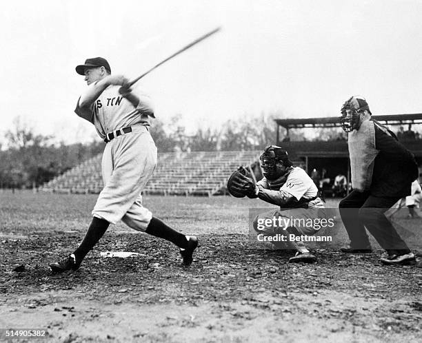 Orlando, FL: Joe Cronin, Manager of the Boston Red Sox, pops out to first in the opening inning of the Washington-Red Sox training camp exhibition...