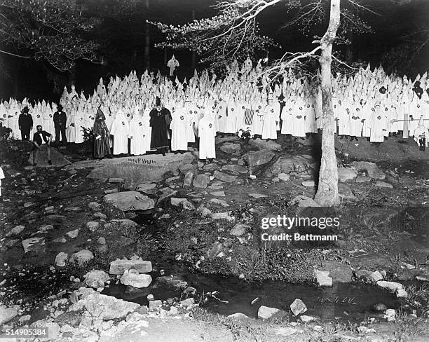 Stone Mountain, GA: A group of Klansmen are in the woods in Stone Mountain, Georgia.