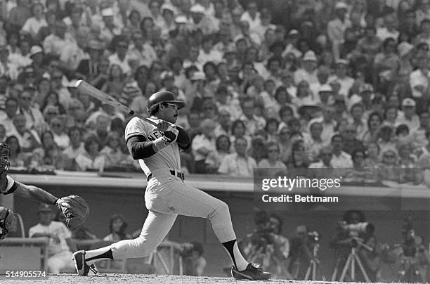 New York Yankees' Reggie Jackson hits a home run in the sixth inning of the fourth game against the Los Angeles Dodgers in the World Series.