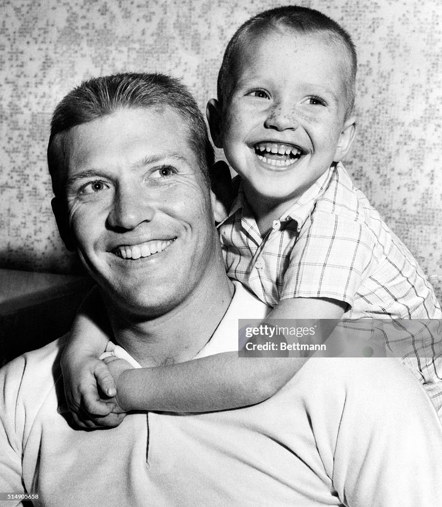 Baseball Player Mickey Mantle Carrying Son Mickey Elvin Mantle