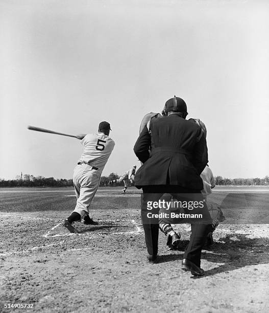 Daytona Beach, FL: Action shot of Dizzy Dean pitching to Hank Greenberg during an exhibition game between the St. Louis Cardinals and the Detroit...