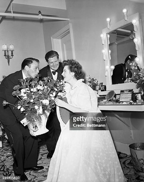 New York, NY- Frank Sinatra sings "Happy Birthday" to actress Deborah Kerr in her dressing room after the opening performance of "Tea and Sympathy"...