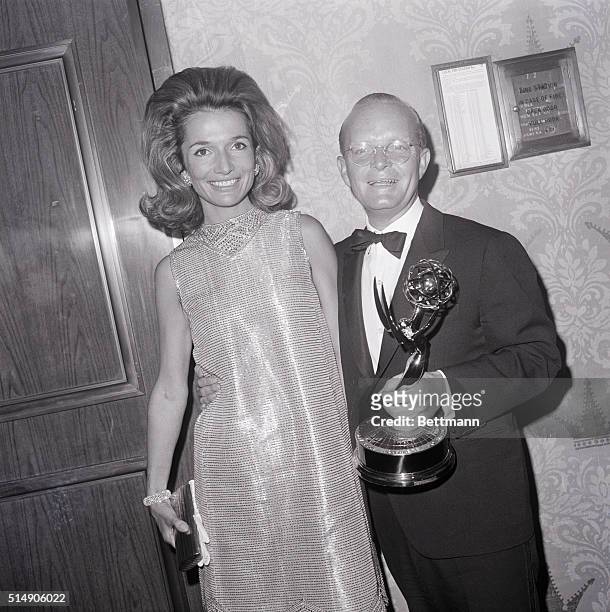 Lee Radziwill and Truman Capote pose for the camera at the Emmy Awards. Capote won his Emmy in the category of Outstanding Individual Achievements...