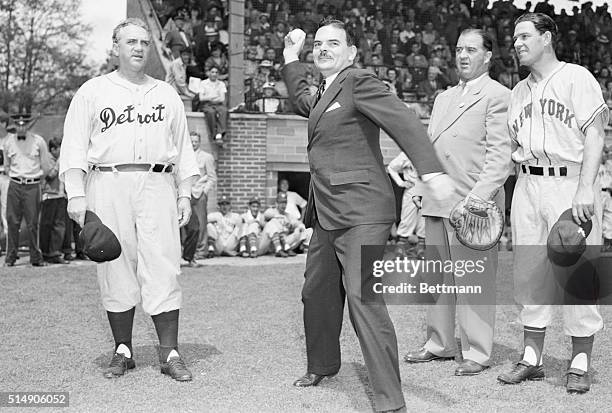 Cooperstown, NY- Governor Thomas E. Dewey hurls the ball for the start of the exhibition game between the Giants and the Detroit Tigers at...