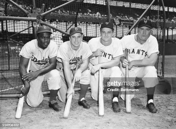 New York, NY- Four National League players who will take part in the All-Star game at Ebbets Field on July 12th line up before the Dodgers-Giants...