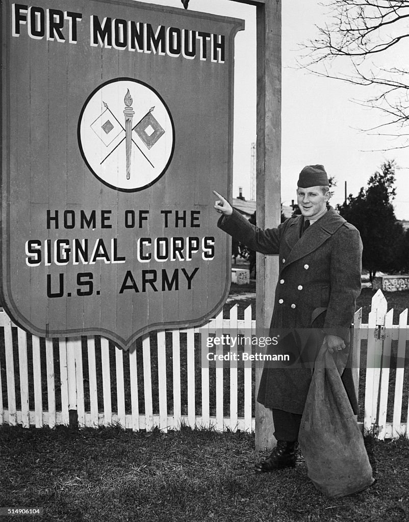Ed "Whitey" Ford Pointing To Sign