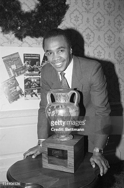 New York, NY: Sugar Ray Leonard accepts the Sports Illustrated's Sportsman of the Year, 1981 trophy December 22. The plaque reads "for symbolizing in...
