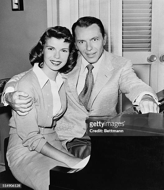 Hollywood, CA: Frank Sinatra and the apple of his eye, daughter Nancy are pictured together at one of their rehearsals for the "Frank Sinatra Show."...