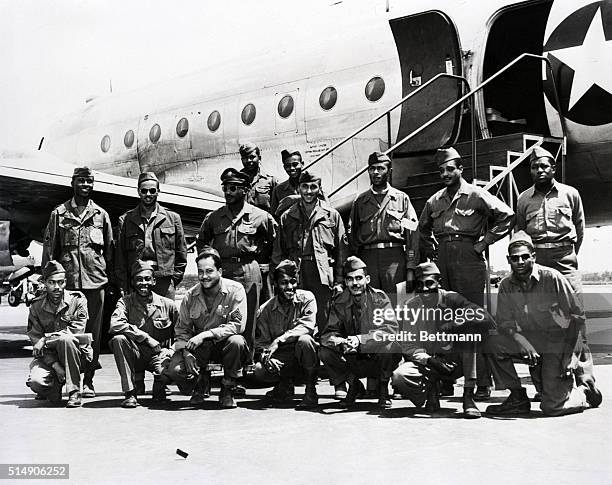 LaGuardia Field, NY- 16 members of the famed 99th Pursuit Squadron, First all Negro AAF combat unit which operated with the 15th Air Force in Italy,...