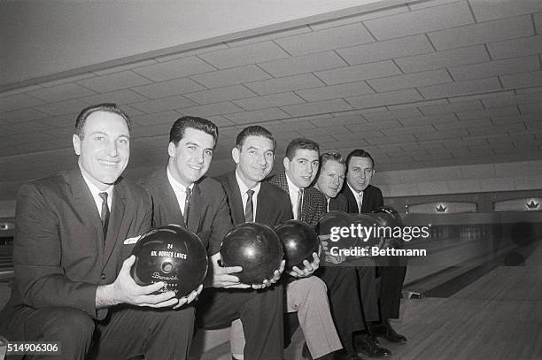 Baseball players Joe Pignatano, Bobby Aspromonte, Sid Gordon, Bobby Giallombardo, Whitey Ford and Gil Hodges prepare to try their skill at bowling.