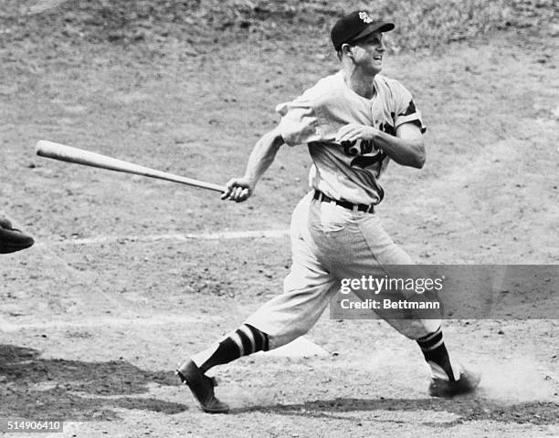 Chicago, IL- Stan Musial, of the Cardinals, slaps out his 1,071st extra base-hit to tie a National League Record held by Mel Ott, former Giants...