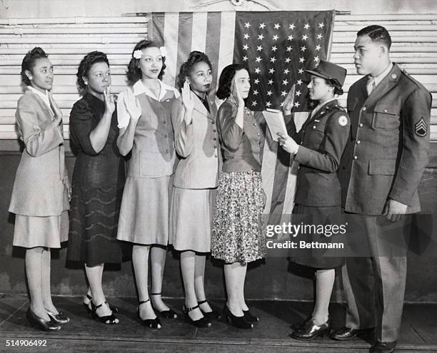 Chicago, IL- When this group of negro girls joined the WAC in Chicago, heavyweight boxing champ Sgt. Joe Louis was on hand to welcome them into the...