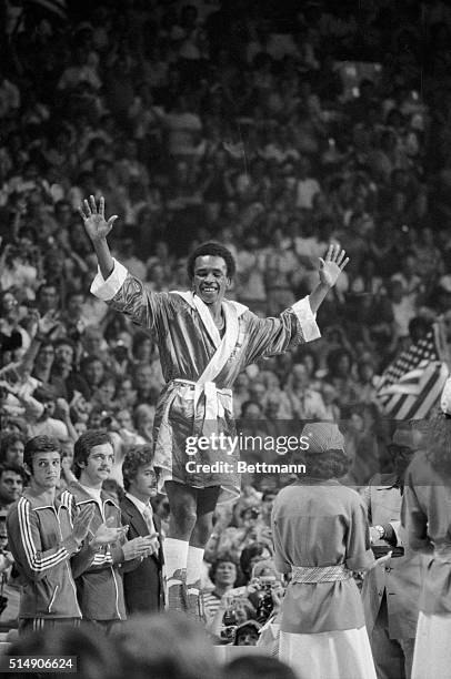 Montreal: The United States' Ray Leonard, Palmer Park, MD., waves as the crowd cheers after he won the Olympic gold medal for the Light Welterweight...