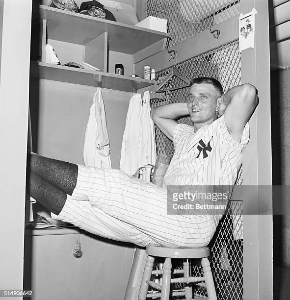 New York: Yankee slugger Roger Maris sits back and relaxes in Yankee Stadium dressing room 9/9, after he slammed his 56th homer in seventh inning of...