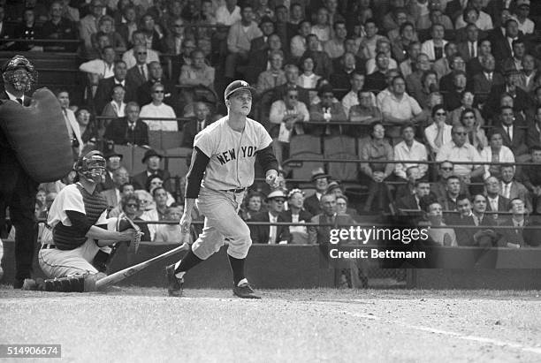 Detroit, MI: Action shot of Yankee Roger Maris hitting his 57th season homer in the third inning against Detroit.