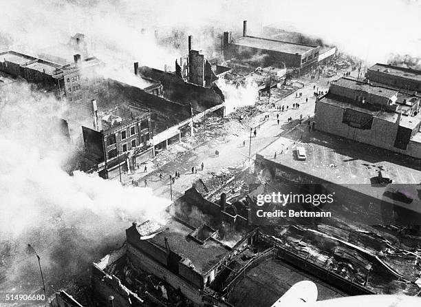 Aerial view of damage in a Chicago business district caused by looting and arson during rioting in the wake of the assassination of Dr. Martin Luther...