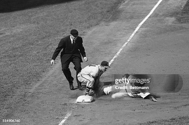 Brooklyn, NY: Rocky Nelson of the Brooklyn Dodgers is out at third base in the sixth inning of the Dodgers-Braves game at Ebbets Field, with Ed...