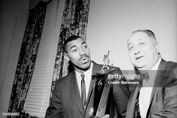 Philadelphia, PA- Wilt Chamberlain sits with his ex-boss Eddie Gottlieb, owner and general manager of the Philadelphia Warriors, with whom Wilt has...