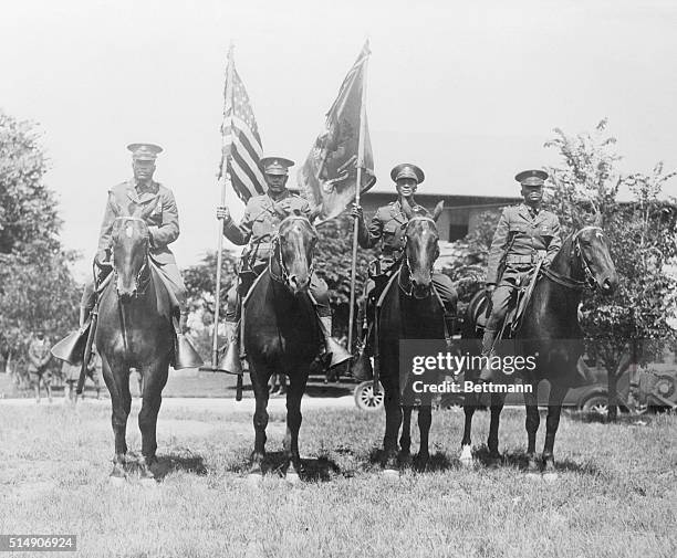 Members of the color guard of th 10th cavalry, a African American regiment which is soon to be broken up and sent to Fort Levenworth, KS and to West...