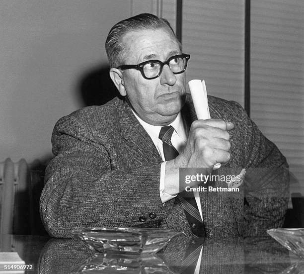 Little Rock, AR: Little Rock Superintendent of Schools Virgil T. Blossom gestures as he makes a point during press conference here Jan 20, at which...