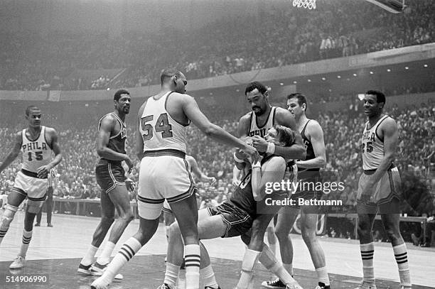 Philadelpia,PA- With 32 seconds left in the NBA playoff game in Phil, the 76ers Wilt Chamberlain put the squeeze on the Celtics Don Nelson and gained...