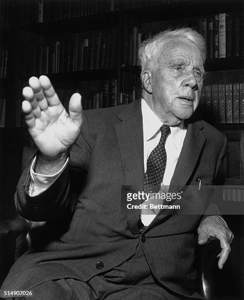Washington, DC- Candid photo of Robert Frost, 84-year-old four-time Pulitzer-prize winning American poet, showing him at a press conference at the...