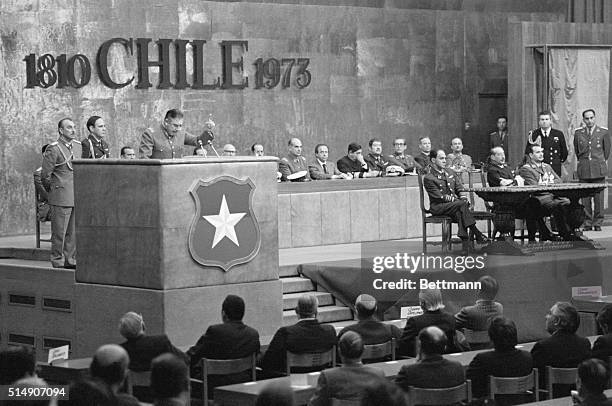 Santiago, Chile- Military junta President General Augusto Pinochet delivers a radio speech, on the one-month anniversary of the military coup that...